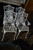 A SET OF FOUR CAST ALLUMINIUM GARDEN CHAIRS INCLUDING TWO CARVERS