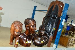 TWO CARVED WOOD AFRICAN BUSTS, a wooden tribal style mask and a carved wooden lion (4)