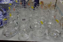 EIGHTEEN DARTINGTON GLASS COMMEMORATIVE TANKARDS, limited edition etc, one signed Frank Thrower,