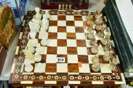 AN ONYX CHESS SET, with board/box
