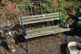 A GARDEN BENCH WITH PAINTED CAST METAL ENDS AND STRETCHER, together with a garden gate, gate