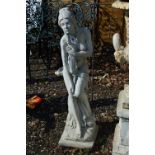 A COMPOSITE GARDEN FIGURINE OF A SEMI CLAD GRECIAN LADY, standing approximately 97cm high
