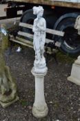 A COMPOSITE GARDEN FIGURE OF A SEMI-CLAD LADY, on a separate column, 127cm high