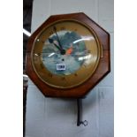 A 20TH CENTURY MAHOGANY OCTAGONAL SINGLE FUSEE WALL CLOCK (pendulum)