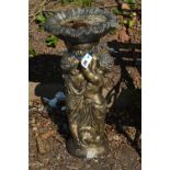 A GOLD PAINTED COMPOSITE BIRD BATH, in the form of two cherubs holding both aloft