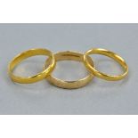 THREE BANDS, one 22ct, ring size L, approximate weight 2.8 grams, one 22ct, ring size P, approximate