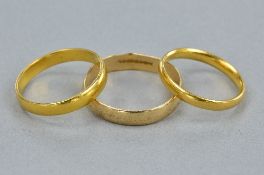 THREE BANDS, one 22ct, ring size L, approximate weight 2.8 grams, one 22ct, ring size P, approximate