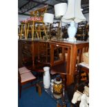 A PAIR OF MODERN MAHOGANY CIRCULAR OCCASIONAL TABLES, two beech kitchen chairs and three table lamps