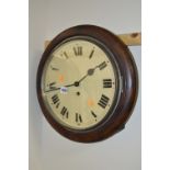 A 20TH CENTURY OAK CIRCULAR WALL CLOCK, with Roman numerals, approximate diameter 41cm