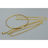 TWO 18CT NECKLACES, and an 18ct bangle, approximate lengths 45cm and 41cm, approximate weight 14