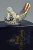 A BOXED ROYAL CROWN DERBY 'MILLENNIUM DOVE' PAPERWEIGHT, exclusive signature edition of 1500 for
