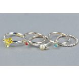 A SELECTION OF FIVE 925 SILVER STACKING RINGS, ring size J1/2, approximate weight 10.3 grams