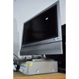 A SHARP 22' LCD TV, and an LG dvd/video recorder (two remotes) (2)