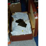 A BROWN LEATHER ON CARD SUITCASE, containing assorted table linen, some embroidered pieces