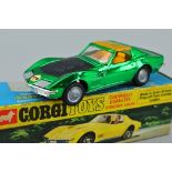 A BOXED CORGI TOYS CHEVROLET CORVETTE STINGRAY COUPE, No.300, metallic green body, black bonnet, '