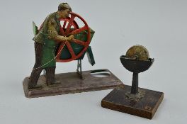 A BING STEAM WHEEL DREDGE WITH OPERATOR, jointed lithographed tinplate figure operating red wheel (