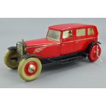 AN UNBOXED CHAD VALLEY LITHOGRAPHED TINPLATE CLOCKWORK SALOON CAR, No.10004, red body, black chassis