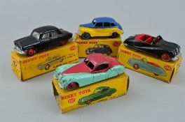 A BOXED DINKY TOYS JAGUAR XK120 COUPE, No.157, turquoise lower body, cerise upper body and hubs,