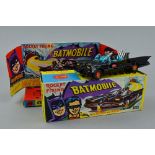 A BOXED CORGI TOYS BATMOBILE, No.267, earlier versions, gloss black with red bat logo on doors and