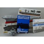 A PART CONTSRUCTED TAMIYA PLASTIC CONSTRUCTION KIT MODEL OF THE U.S. AIRCRAFT CARRIER CVN65 '