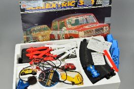 A BOXED SCALEXTRIC 300 MOTOR RACING SET, comprising 2 x Mini Clubman 1275GT, No.C122, one in red,