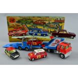 A BOXED CORGI TOYS GIFT SET, No.41, comprising Ford H series articulated transporter, No.1138, Rover