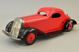A MARX TINPLATE CLOCKWORK SALOON CAR, British made, red body and hubs, black chassis and