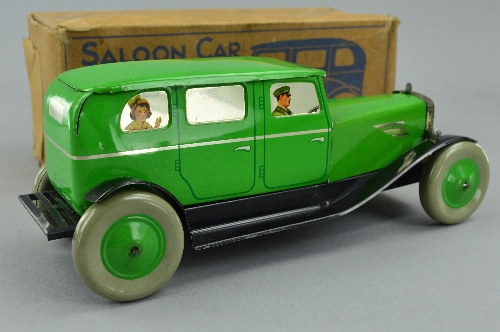 A BOXED CHAD VALLEY LITHOGRAPHED TINPLATE CLOCKWORK SALOON CAR, No.10004, green body, black - Bild 2 aus 4