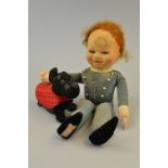 A CHAD VALLEY FELT AND CLOTH DOLL, moulded felt face with blue glass eyes and painted features,