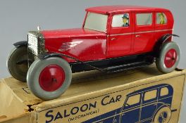 A BOXED CHAD VALLEY LITHOGRAPHED TINPLATE CLOCKWORK SALOON CAR, No.10004, red body, black chassis