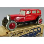 A BOXED CHAD VALLEY LITHOGRAPHED TINPLATE CLOCKWORK SALOON CAR, No.10004, red body, black chassis