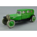 AN UNBOXED CHAD VALLEY LITHOGRAPHED TINPLATE CLOCKWORK SALOON CAR, No.10004, green body, black