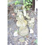 THIRTEEN SMALL GARDEN FIGURES, and a bird bath top (14)