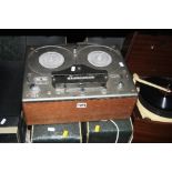 A PYE RECORD PLAYER, with Monarch turntable to inner, a Tandberg reel to reel player, a Bush