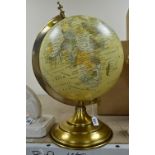 A MODERN GLOBE ON A METAL BASE, with Indian territorial waters, dated 2010, approximately 50cm in