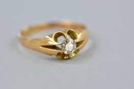 AN EARLY 20TH CENTURY SINGLE STONE DIAMOND RING, gypsy set, estimated old cut diamond weight 0.28ct,