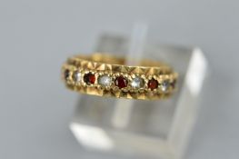 A 9CT GOLD SYNTHETIC SPINEL AND GARNET FULL ETERNITY RING, ring size K, approximate gross weight 3.2