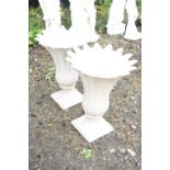 A PAIR OF PLASTIC PINK MARBLE EFFECT GARDEN PLANTERS, in the form of open flower heads