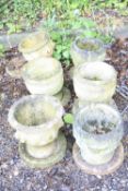 THREE PAIRS OF SMALL COMPOSITE GARDEN URNS (6)