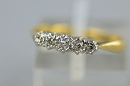 A MID-20TH CENTURY FIVE STONE DIAMOND HALF HOOP RING, estimated diamond weight 0.10ct, ring size