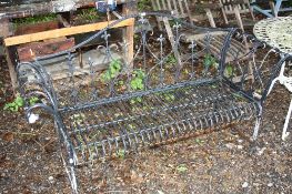 A METAL GARDEN BENCH, with scrolled arms
