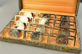 A BOXED SET OF TWELVE PLATED FRENCH CARD HOLDERS
