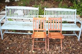 A PAIR OF PAINTED WOODEN GARDEN BENCHES, and a pair of folding chairs, approximate length 120cm (4)