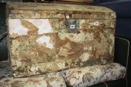 A VINTAGE PINE DOMED TRUNK, partly stripped of wallpaper and decoupage interior
