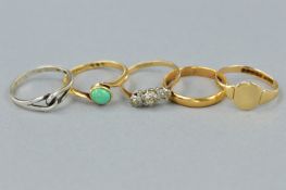 A COLLECTION OF RINGS, to include: an early 20th century three stone diamond ring, estimated old cut