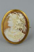 A MID 20TH CENTURY CAMEO OVAL BROOCH, a classic carving of Bacchante, celebrant of Bacchus, god of