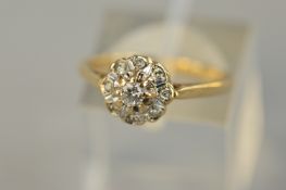 A 9CT DIAMOND AND CLUSTER RING, ring size J, approximate weight 2.0 grams