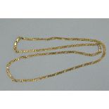 A MODERN 9CT GOLD FILED FIGARO CHAIN, measuring approximately 740mm in length, approximate gross