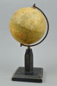 A GEOGRAPHIA 6 INCH TERRESTRIAL GLOBE, on wooden stand (faded)