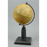 A GEOGRAPHIA 6 INCH TERRESTRIAL GLOBE, on wooden stand (faded)